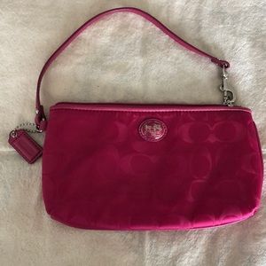 Coach wristlet (color pink)